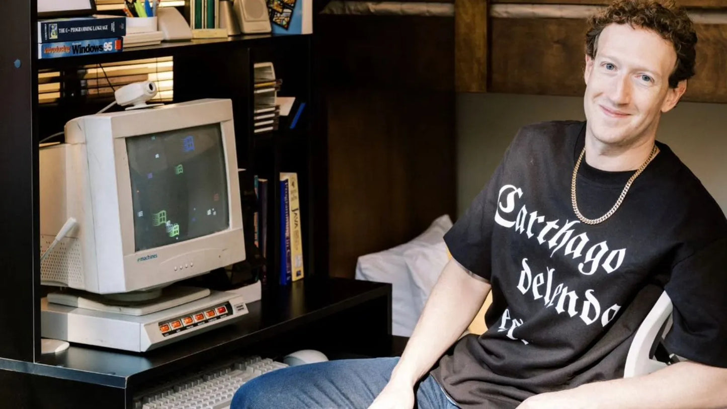 Tech billionaire sitting in front of a vintage computer with a bookshelf in the background and a Roman Empire clothing